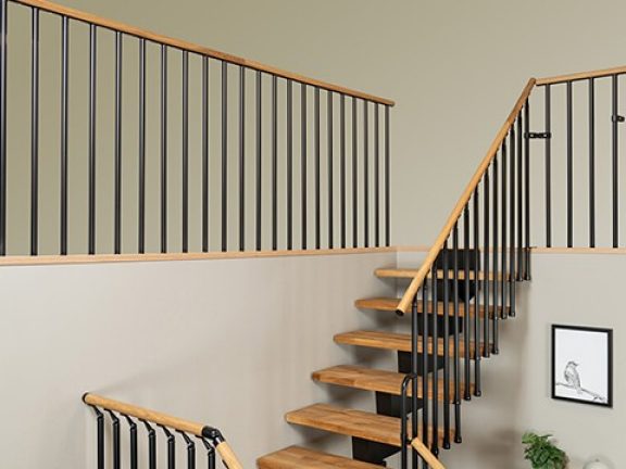 Trap met trapleuning en balustrade op maat