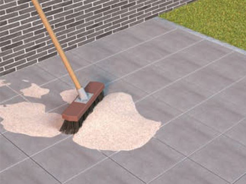 Terrastegels inkeren met voegzand