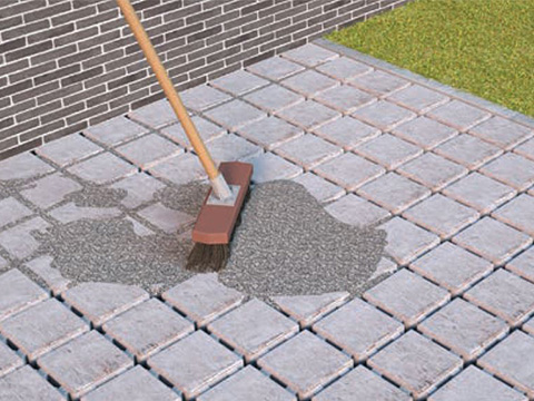 Betonstraatstenen inkeren met voegzand